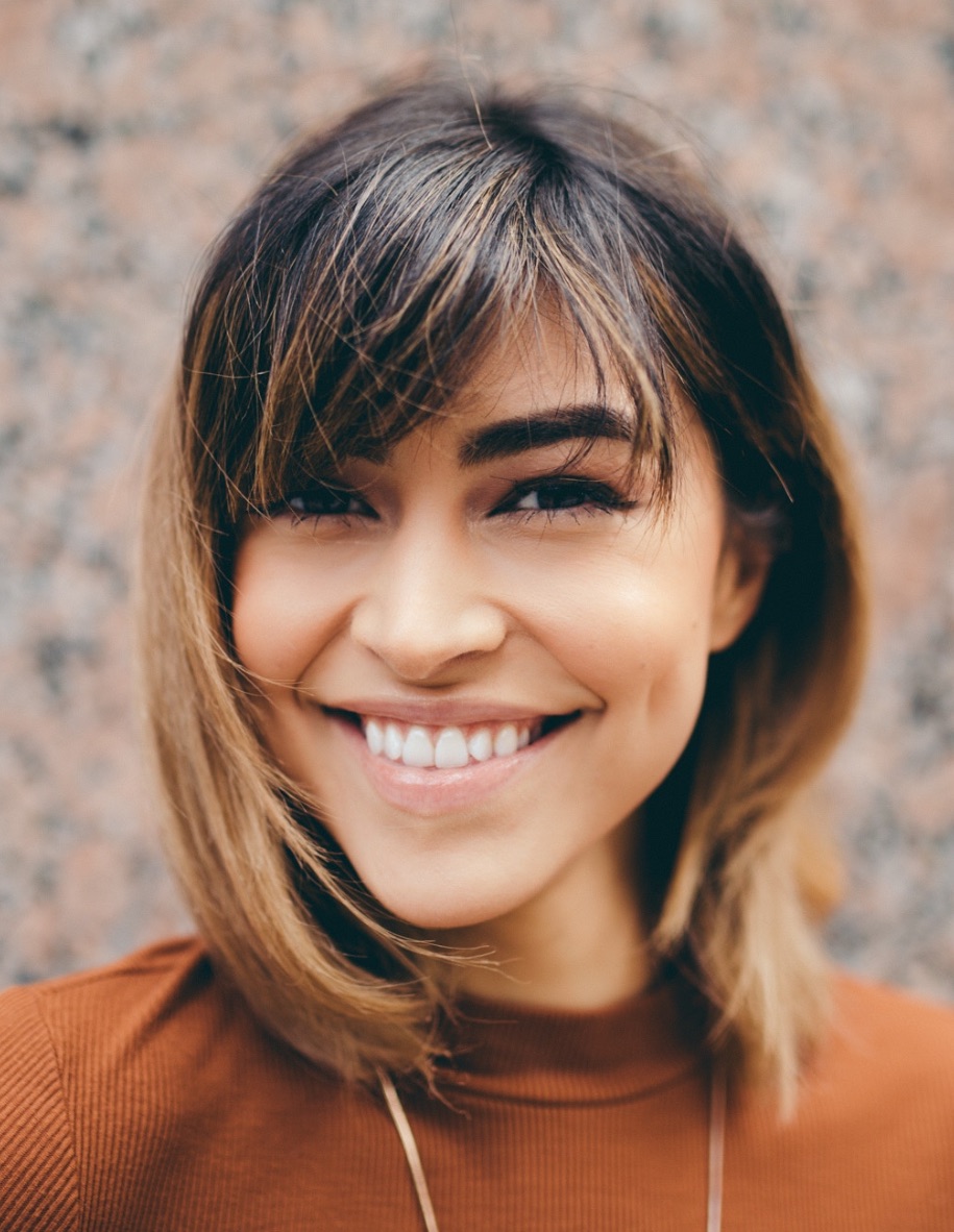 photo of a young woman smiling